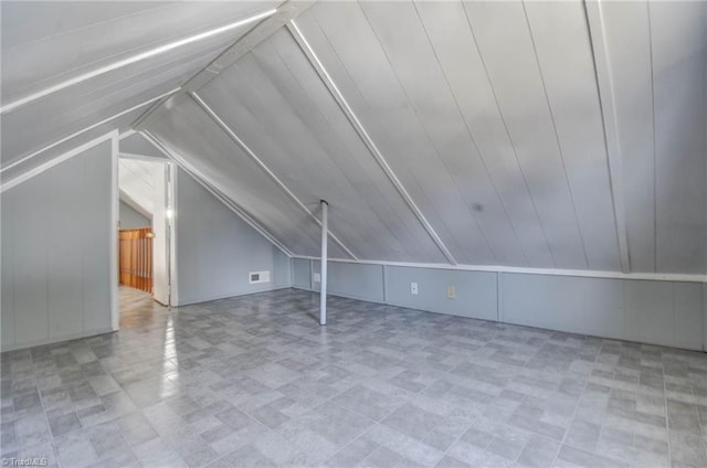 bonus room featuring lofted ceiling