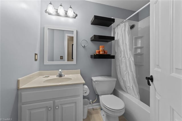 900 Biloxi Ave, Kernersville, NC 27284 - full bath with toilet, shower / tub combo with curtain, baseboards, and vanity