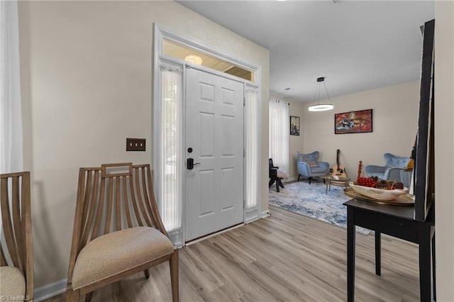 900 Biloxi Ave, Kernersville, NC 27284 - entryway with baseboards and light wood-type flooring