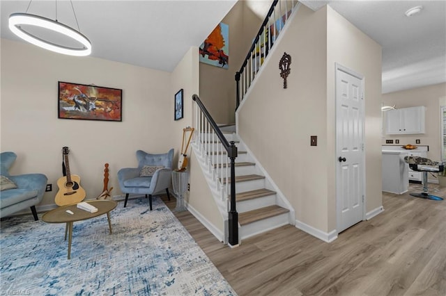 900 Biloxi Ave, Kernersville, NC 27284 - stairs featuring wood finished floors and baseboards
