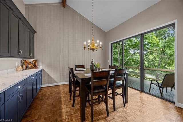 3715 Bentbrook Dr, High Point, NC 27265 - dining room with a chandelier and wooden walls