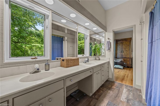 3715 Bentbrook Dr, High Point, NC 27265 - full bath featuring double vanity and wood finished floors