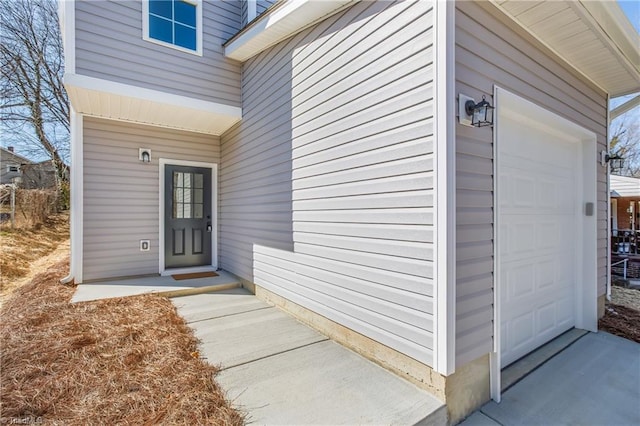 entrance to property with a garage