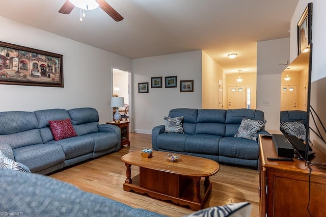 4036 Eastside Ct, Winston-Salem, NC 27127 - living room featuring a ceiling fan and wood finished floors