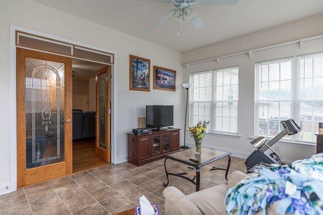 4036 Eastside Ct, Winston-Salem, NC 27127 - living area with a ceiling fan, baseboards, and healthy amount of natural light