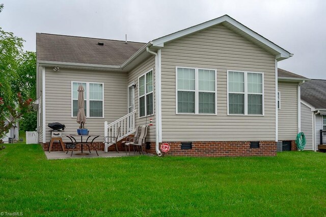 4036 Eastside Ct, Winston-Salem, NC 27127 - back of house with crawl space, a yard, a patio area, and central air condition unit