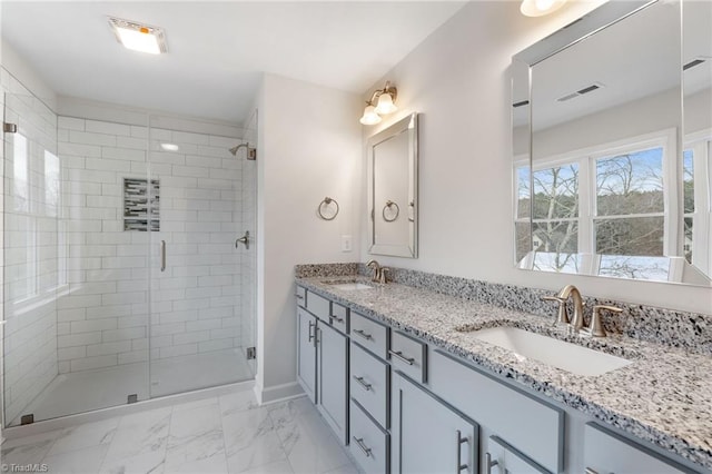 full bathroom with a stall shower, visible vents, marble finish floor, and a sink