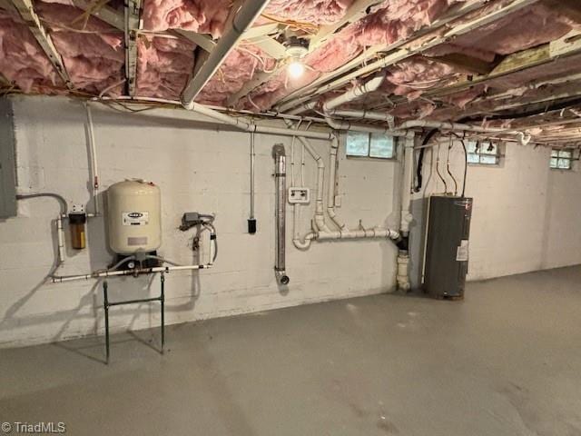 basement featuring electric water heater