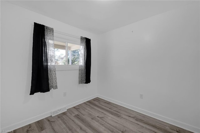 empty room featuring light hardwood / wood-style flooring