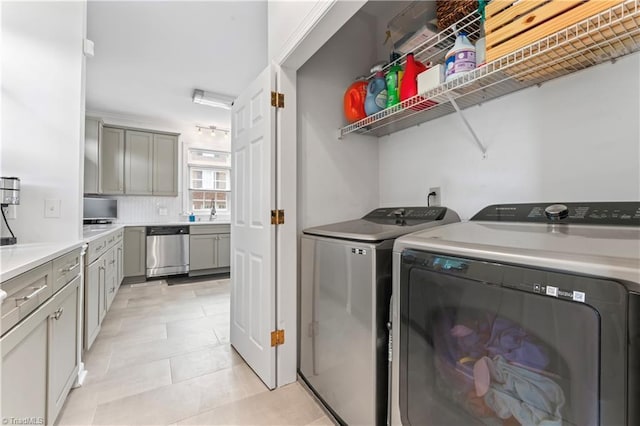 3401 Lochurst Ct, Pfafftown, NC 27040 - washroom featuring washing machine and dryer and light tile patterned floors