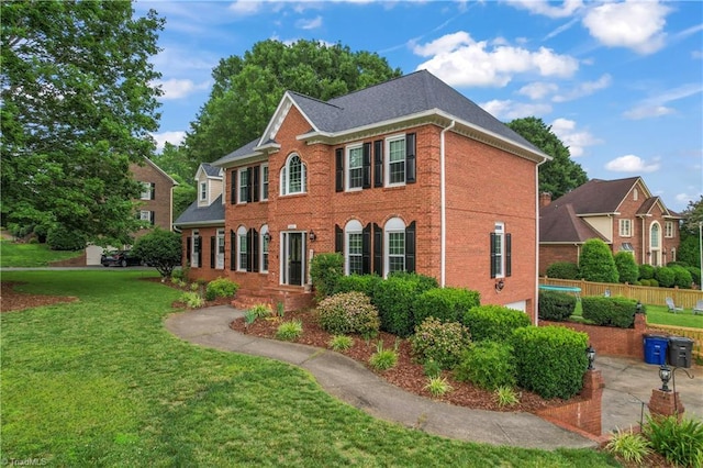 3401 Lochurst Ct, Pfafftown, NC 27040 - colonial inspired home with brick siding and a garage