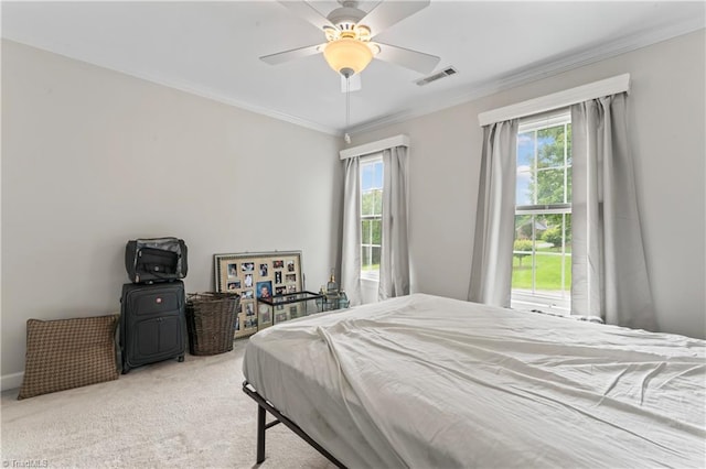 3401 Lochurst Ct, Pfafftown, NC 27040 - carpeted bedroom with multiple windows, ornamental molding, and a ceiling fan