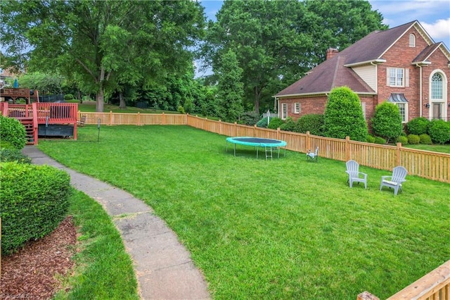 3401 Lochurst Ct, Pfafftown, NC 27040 - view of yard featuring a trampoline and a deck