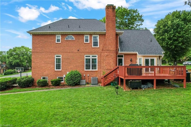 3401 Lochurst Ct, Pfafftown, NC 27040 - rear view of property featuring a chimney, cooling unit, a yard, and a wooden deck