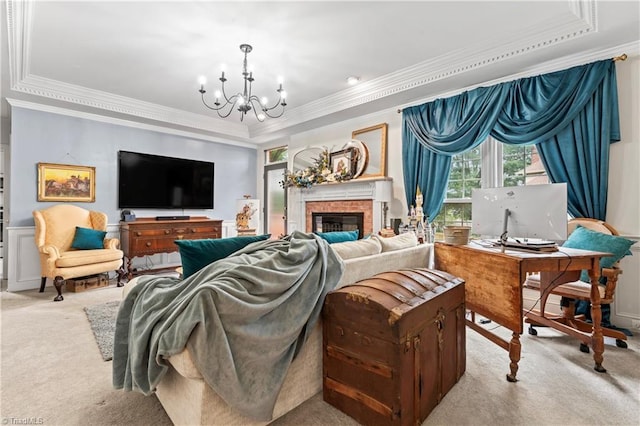 3401 Lochurst Ct, Pfafftown, NC 27040 - living area featuring carpet flooring, crown molding, a chandelier, a tray ceiling, and a brick fireplace