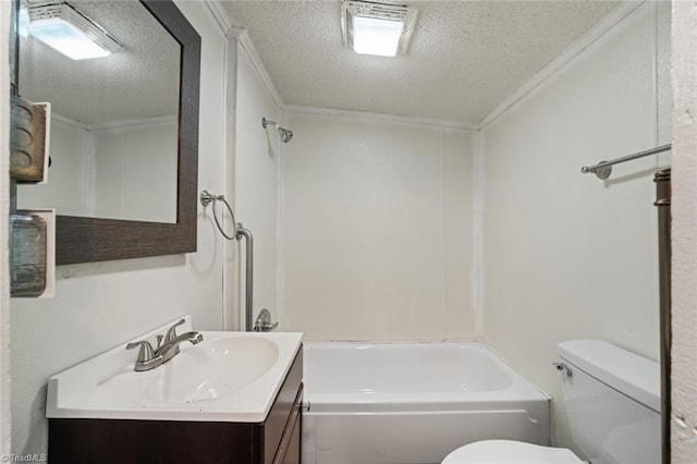 bathroom with a textured ceiling, toilet, and vanity