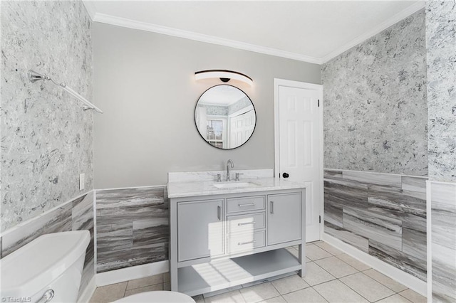 bathroom with crown molding, tile walls, and toilet