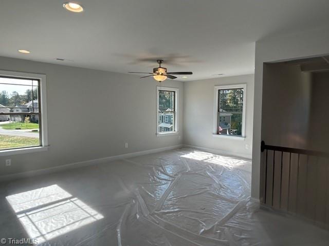 unfurnished room featuring ceiling fan