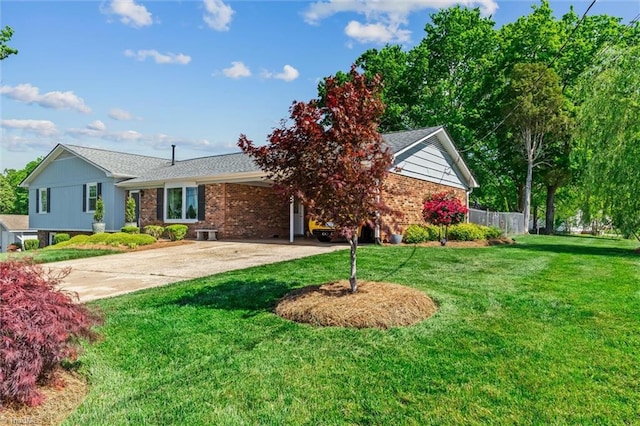 100 Monroe Dr, Lexington, NC 27295 - single story home with driveway, a front yard, a carport, brick siding, and fence