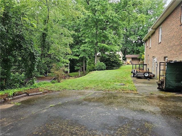 4875 Follansbee Rd, Winston-Salem, NC 27127 - view of grassy yard with a view of trees