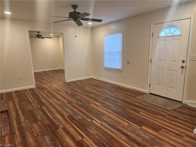 foyer with baseboards, dark wood-type flooring, and recessed lighting