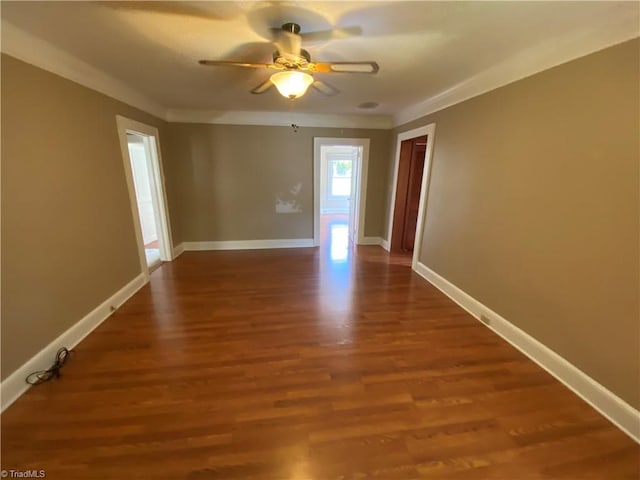 spare room featuring ceiling fan and hardwood / wood-style flooring