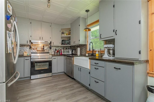 704 Summit Rd, High Point, NC 27265 - kitchen featuring appliances with stainless steel finishes, open shelves, dark countertops, under cabinet range hood, and an ornate ceiling