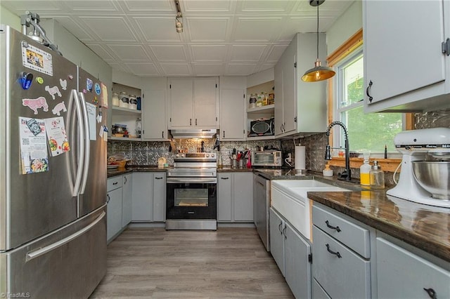 704 Summit Rd, High Point, NC 27265 - kitchen featuring appliances with stainless steel finishes, open shelves, an ornate ceiling, under cabinet range hood, and tasteful backsplash