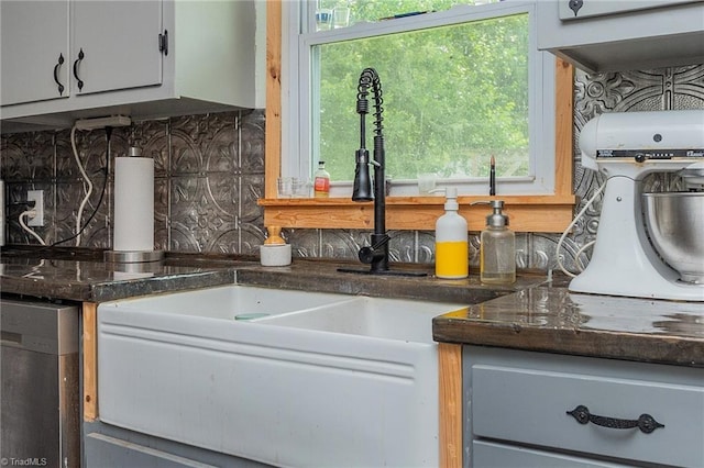 704 Summit Rd, High Point, NC 27265 - kitchen with decorative backsplash, dark countertops, and white cabinetry