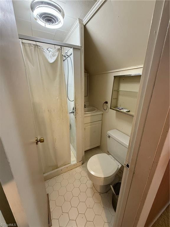 bathroom featuring vanity, curtained shower, and toilet