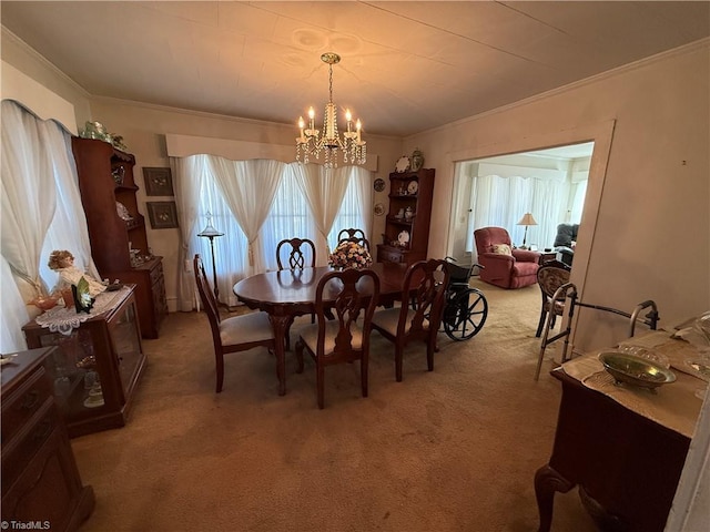 carpeted dining room featuring ornamental molding and a notable chandelier