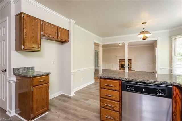 kitchen featuring light wood-style flooring, hanging light fixtures, decorative columns, brown cabinets, and stainless steel dishwasher