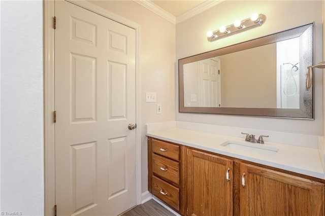 bathroom featuring vanity and ornamental molding
