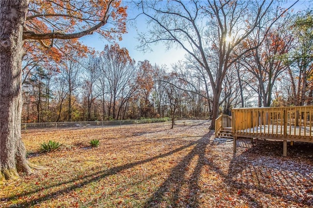 view of yard featuring a wooden deck