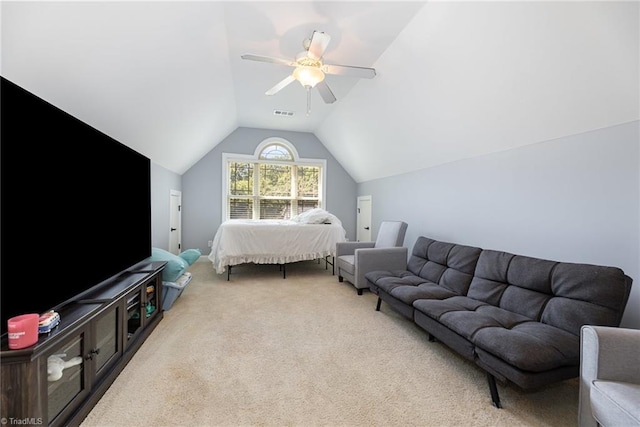 bedroom with carpet floors, ceiling fan, lofted ceiling, and visible vents