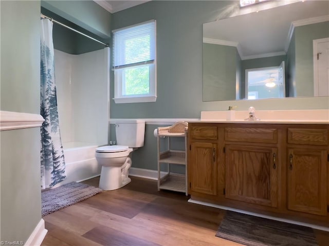 2065 Ardmore Village Ln, Winston-Salem, NC 27127 - bathroom featuring crown molding, wood finished floors, toilet, shower / bathtub combination with curtain, and vanity