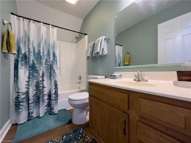 2065 Ardmore Village Ln, Winston-Salem, NC 27127 - bathroom with wood finished floors, toilet, shower / bath combination with curtain, vanity, and lofted ceiling
