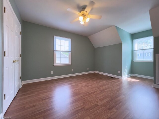 2065 Ardmore Village Ln, Winston-Salem, NC 27127 - additional living space with ceiling fan, dark wood finished floors, baseboards, and vaulted ceiling