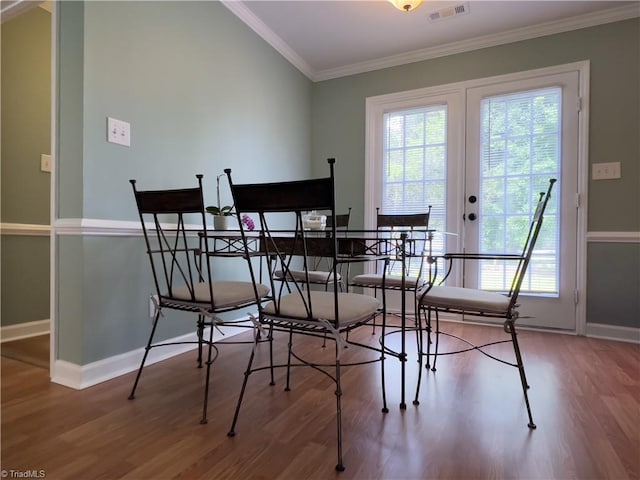 2065 Ardmore Village Ln, Winston-Salem, NC 27127 - dining area featuring plenty of natural light, crown molding, wood finished floors, baseboards, and french doors
