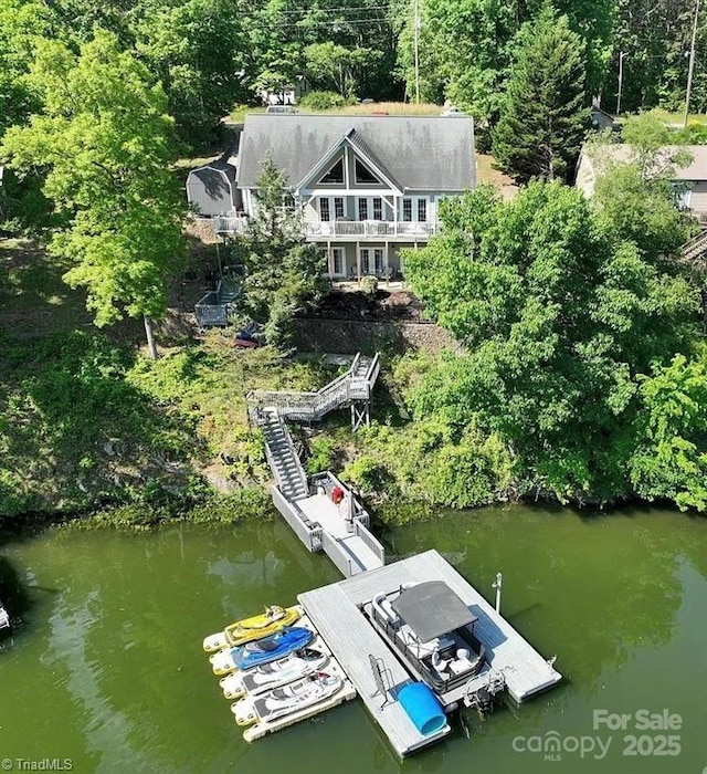 126 Strand Dr, New London, NC 28127 - aerial view of property and surrounding area with a nearby body of water