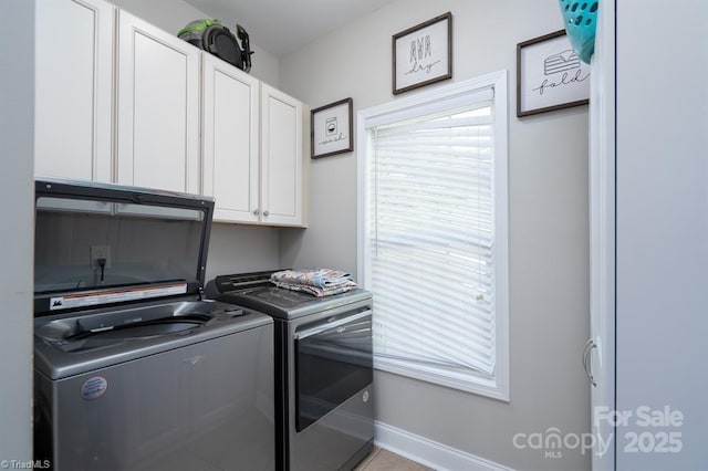126 Strand Dr, New London, NC 28127 - washroom with cabinet space, independent washer and dryer, and baseboards