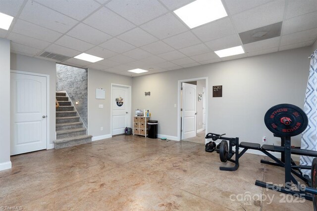 126 Strand Dr, New London, NC 28127 - workout area featuring a paneled ceiling and baseboards