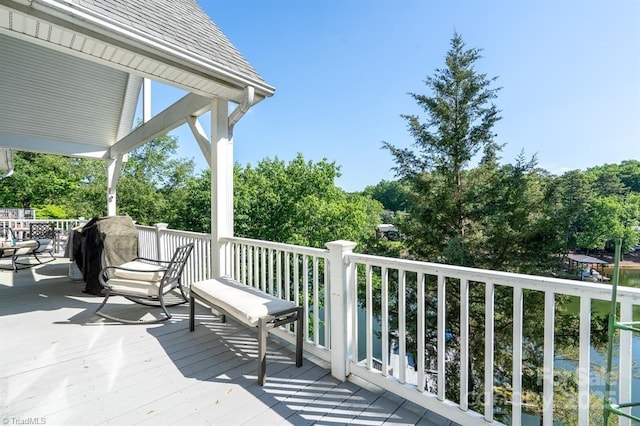 126 Strand Dr, New London, NC 28127 - wooden deck with view of scattered trees