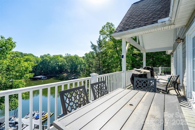 126 Strand Dr, New London, NC 28127 - deck featuring a water view and outdoor dining space