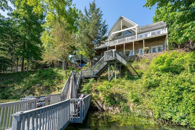 126 Strand Dr, New London, NC 28127 - back of property featuring stairway