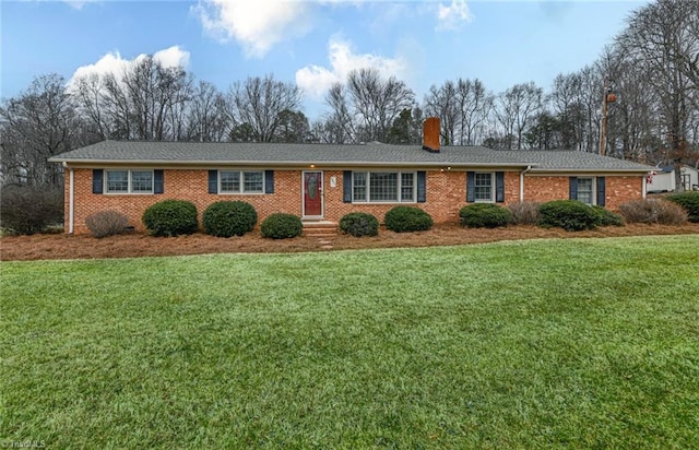 ranch-style house with a front yard