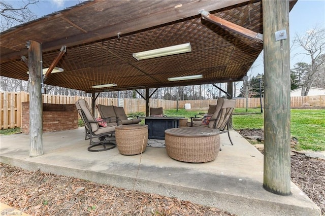 view of patio featuring a fire pit