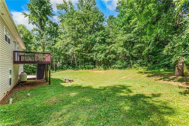 162 N Hazelwood Dr, Mocksville, NC 27028 - view of grassy yard with stairs and a wooden deck