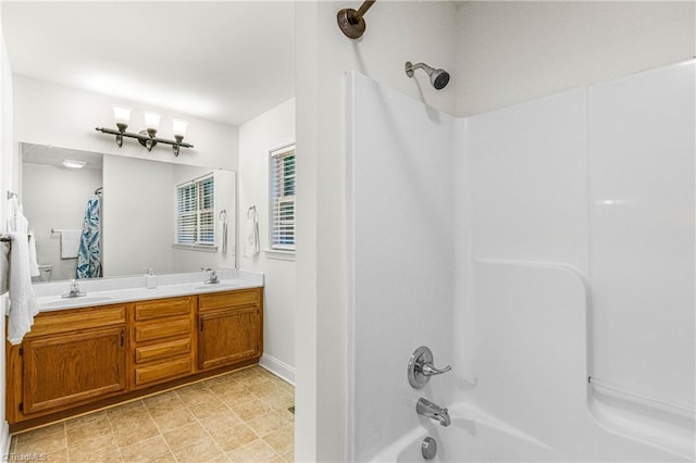 162 N Hazelwood Dr, Mocksville, NC 27028 - bathroom with shower / bathtub combination with curtain and double vanity