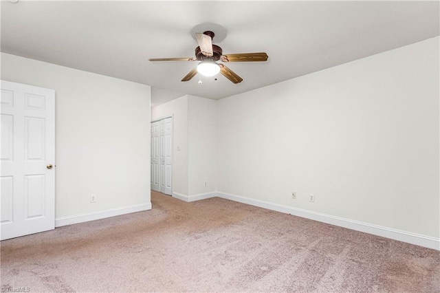 162 N Hazelwood Dr, Mocksville, NC 27028 - unfurnished bedroom with carpet floors, ceiling fan, and a closet